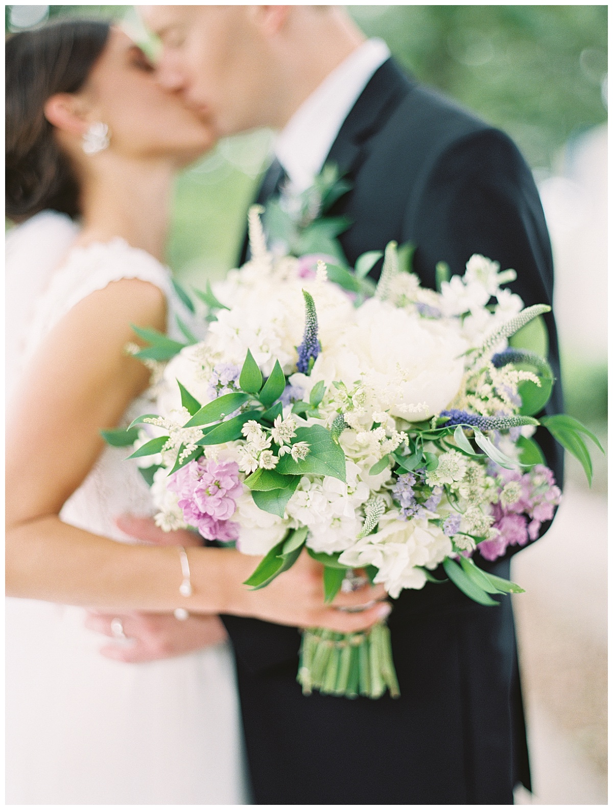 Ivory and purple Piazza on the Green Wedding Flowers