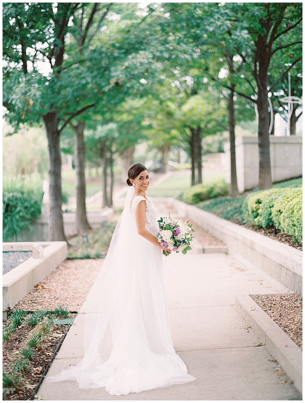 Ivory and purple Piazza on the Green Wedding Flowers