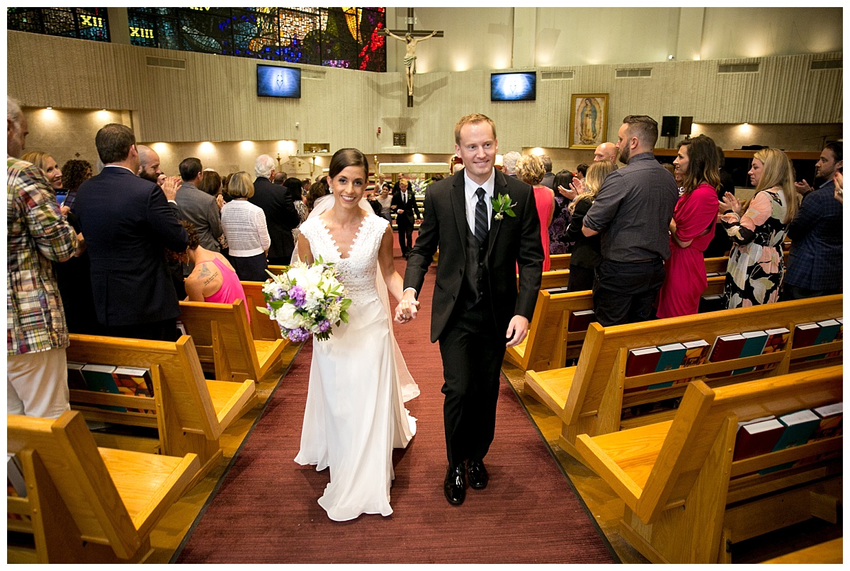 Ivory and purple Piazza on the Green Wedding Flowers